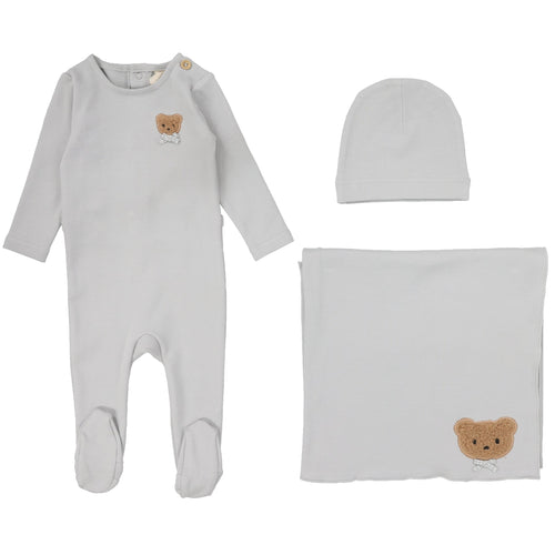 Baby outfit set with onesie, hat, and blanket featuring teddy bear designs.