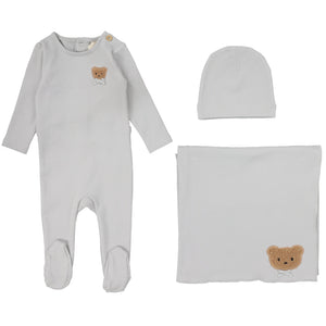 Baby outfit set with onesie, hat, and blanket featuring teddy bear designs.